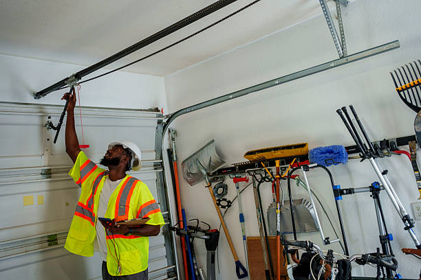 Professional Garage Door Panel Replacement technician working in Ellis, KS